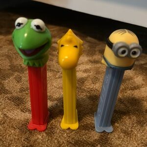 3 Pez dispensers. Kermit, Woodstock, and a Minion.